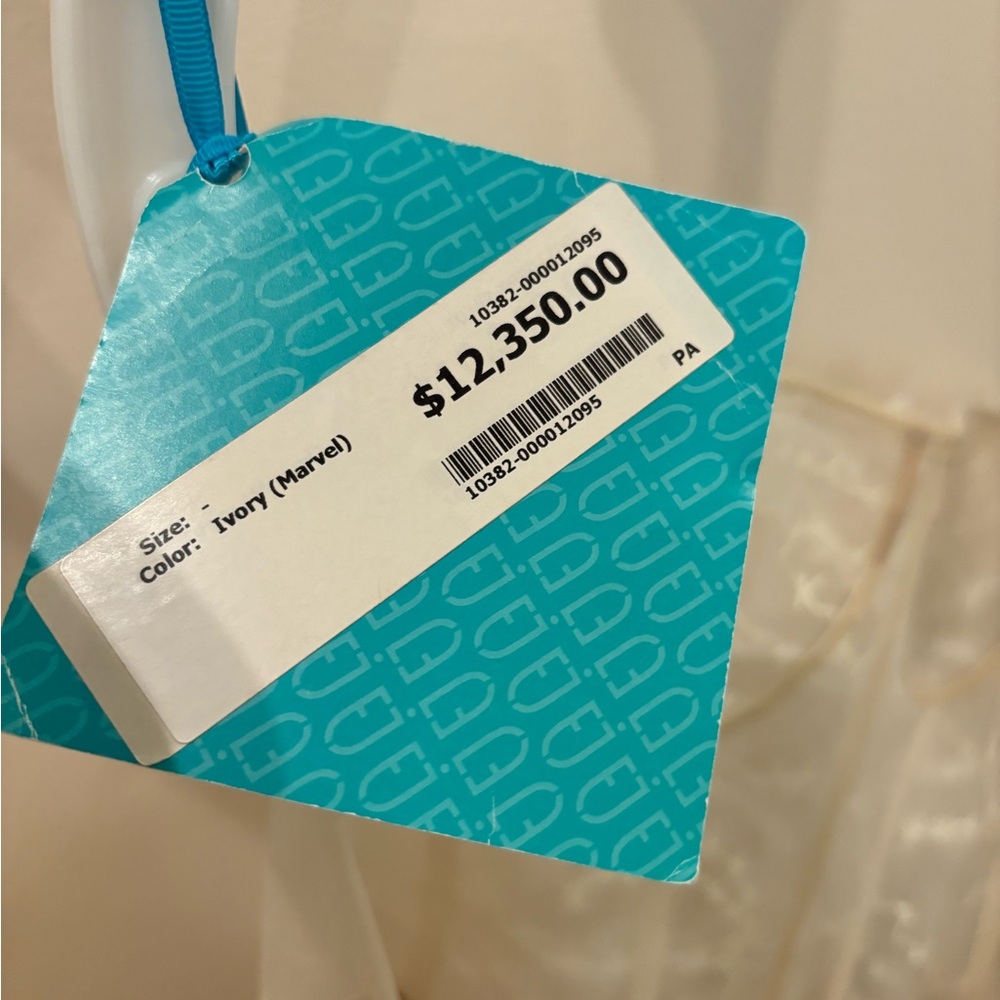 Mira Zwillinger Marvel
Elegant White Strapless Wedding Dress - Picture 2 of 16